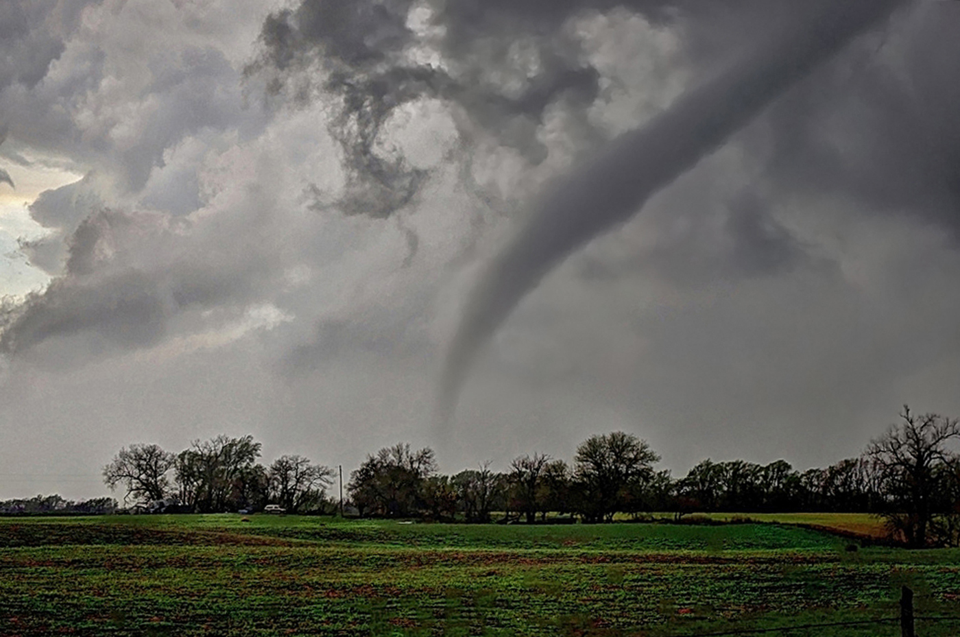 A tornado dances above the tree line near Willow Oklahoma. March 2012