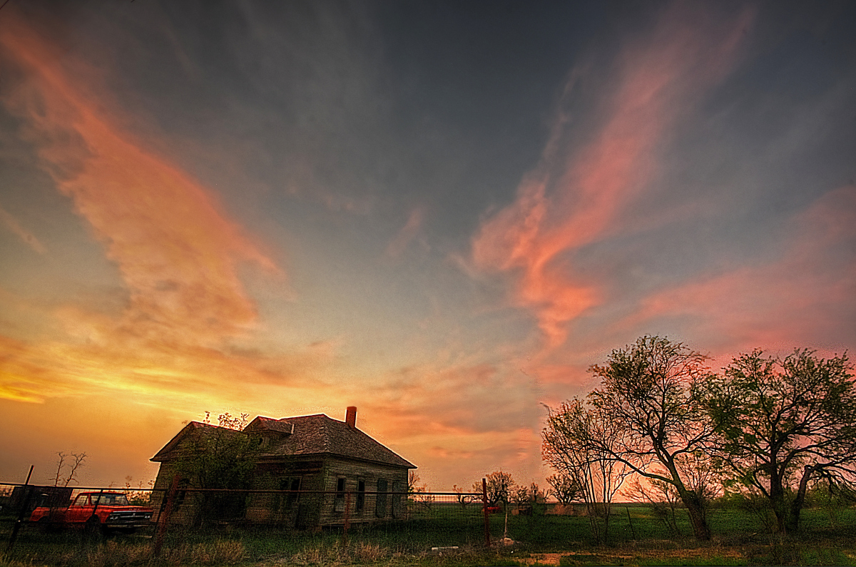 September 2014 Contrast of Feelings-A beautiful sunset over a home in the Texas Panhandle.