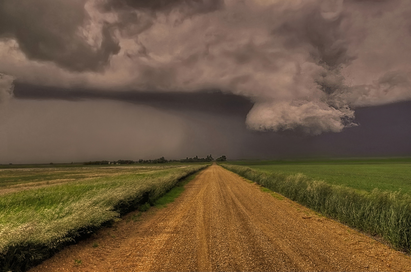 A rapidly rotating wall cloud spins above the Saskatchewan Canada plains. This tornado had already produced two violent tornadoes earlier. June 2012 A rapidly rotating wall cloud spins above the Saskatchewan Canada plains. This tornado had already produced two violent tornadoes earlier. June 2012