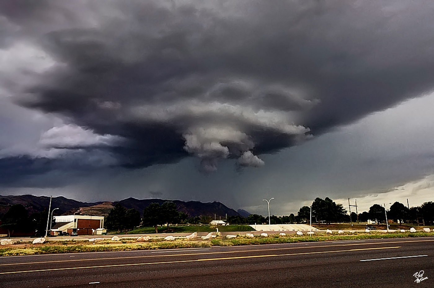 Mountain Top Meso Up until this day in June of 2012 I had not seen a tornado warned storm with intense rotation so close to the Rocky Mountains. This storm nearly put a tornado down and the sight of it spinning West of Colorado Springs was incredible.