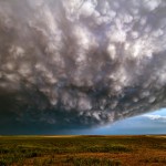 Not my favorite shot from 2013 but it is my most liked photo ever with over 7,000 likes and over 6,000 shares. On our way home from chasing in north east Colorado on 6/15/13, just east of Limon I caught a glimpse of this in the side mirror and had to find a side road so I could take a photo. I call it, "Mammatus mothership"