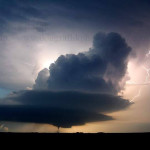 My first post to the group. Taken 10 years and 2 days ago. The storm / tornado is near Red Cloud, Nebraska. I was 6 miles south of the storm. At sunset, all the low level clouds dissipated, leaving a clear view to this supercell.