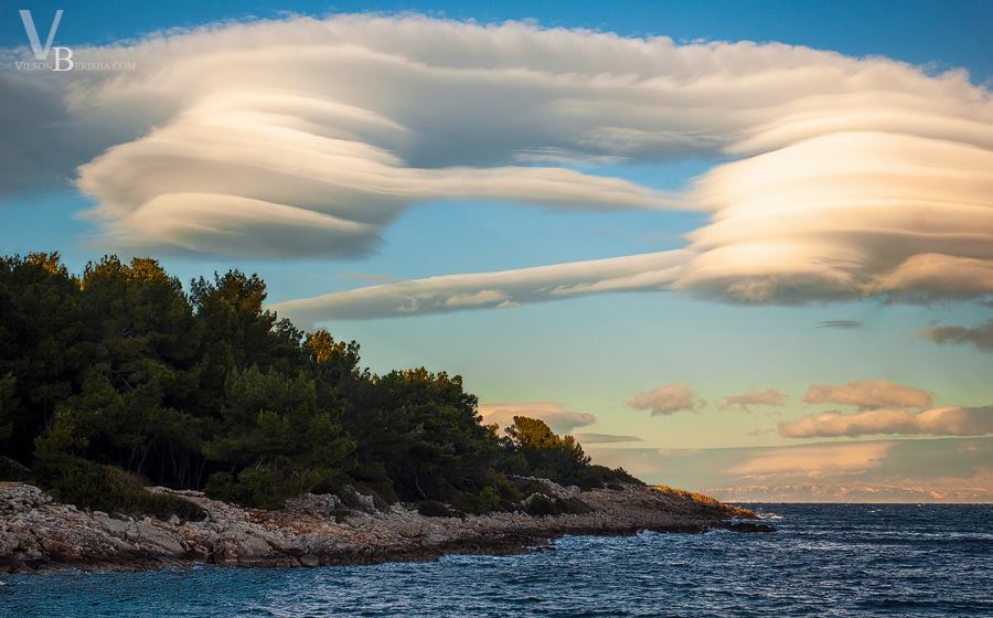 Another spectacular view of Lenticularis cloud with awesome smooth layered appearance. Croatia/Island Losinj 01.01.2015 Another spectacular view of Lenticularis cloud with awesome smooth layered appearance. Croatia/Island Losinj 01.01.2015